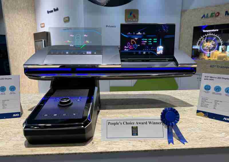 财神娱乐车用Micro LED Display HMI解决方案获”最佳车用显示奖”，，，以用户为中心开发，，针对前座驾驶与乘客设计兼具娱乐与安全的高画质屏幕，，，包含车舱前座的Micro LED透明屏幕及全球首款内建镜头的智慧Micro LED显示器